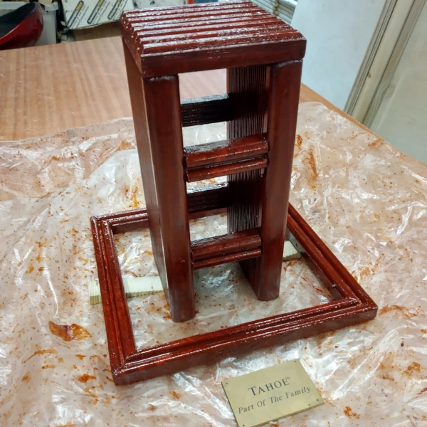 My late dog, Tahoe's memorial plaque and wooden flower pot plinth.